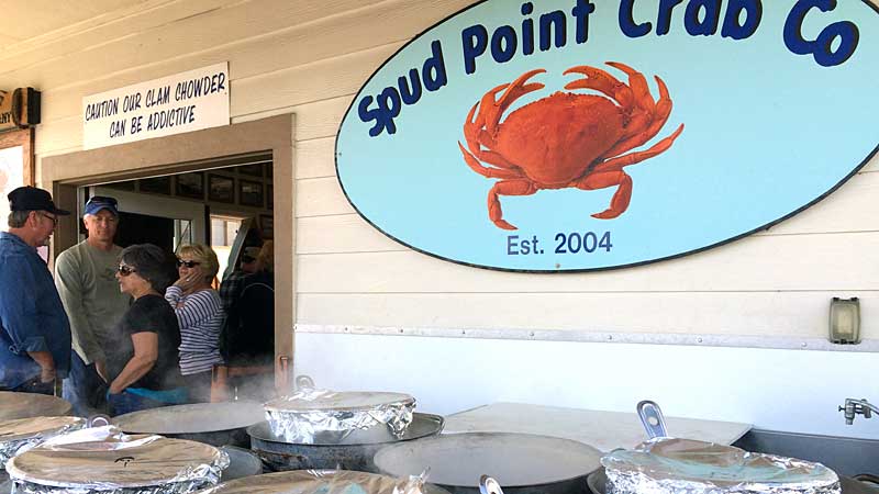 People wait in line at this little shack to get tasty sandwiches and chowder