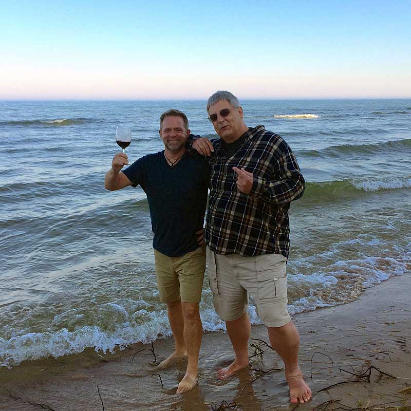 J.D. and Jim, walking the beach...