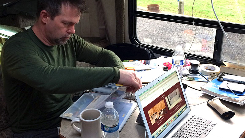 J.D., assembling his state-by-state binder